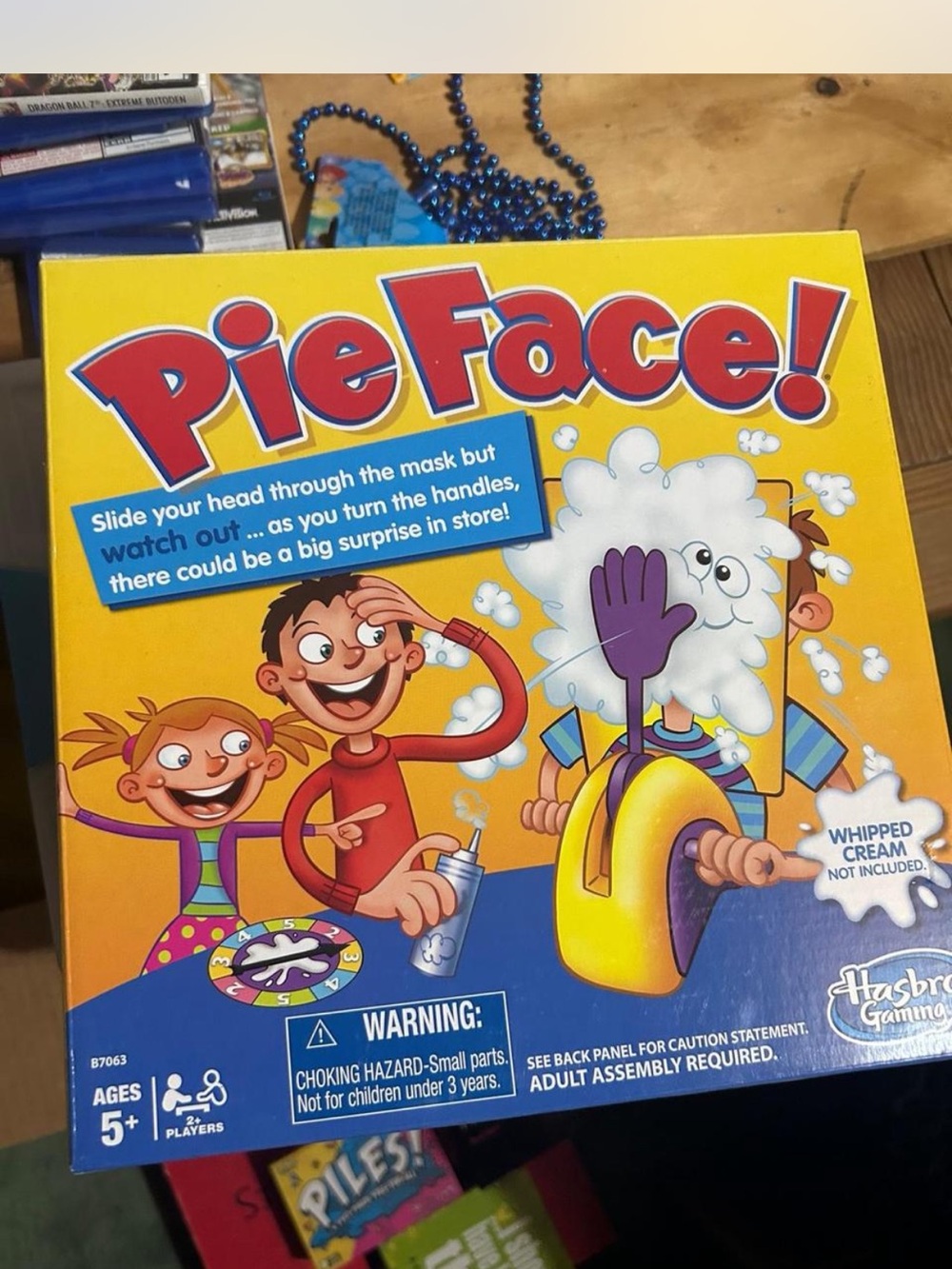 Hasbro Pie Face! Family Game - Yellow and Red Box Art